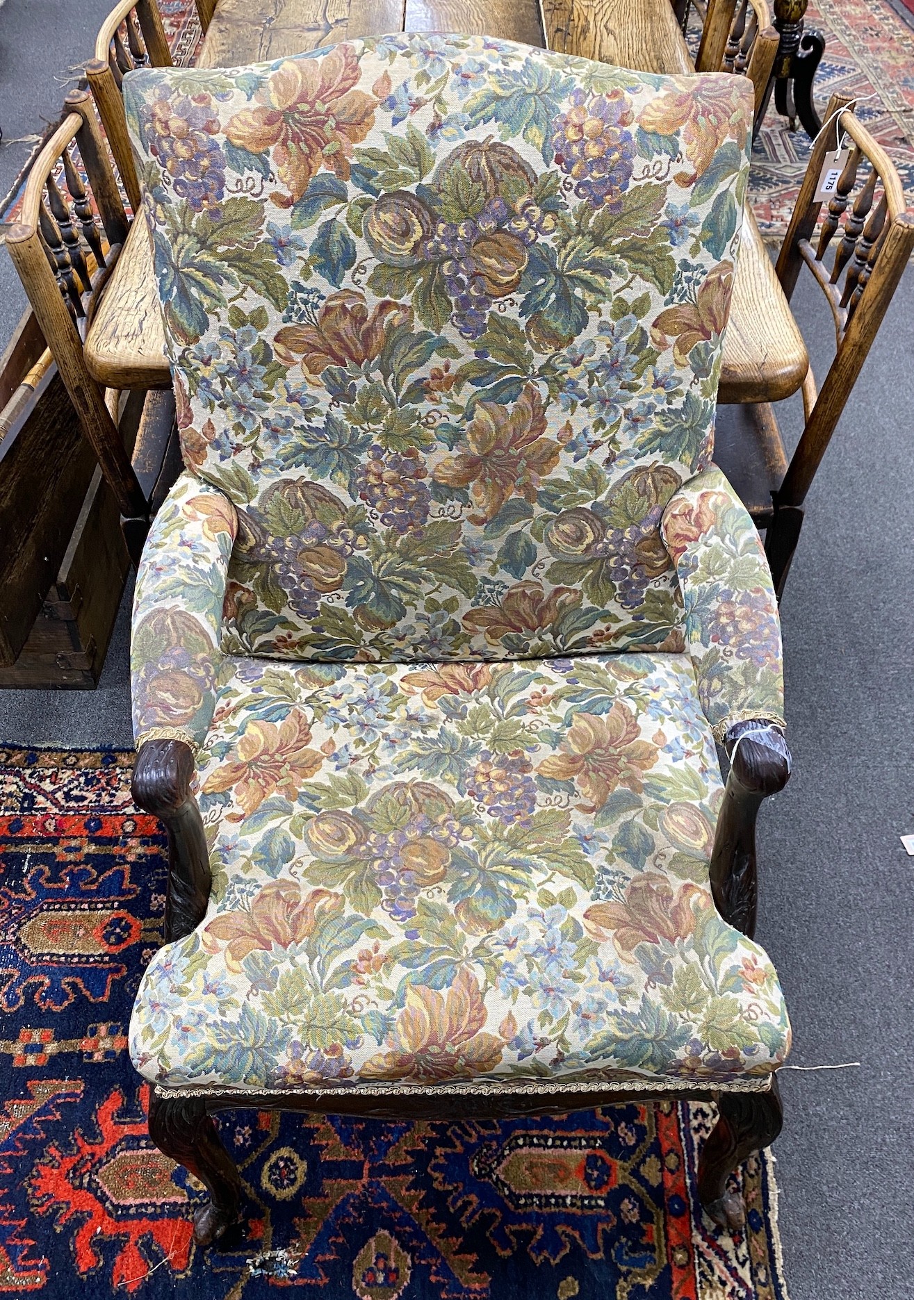 A George III upholstered open armchair, width 62cm, depth 58cm, height 108cm